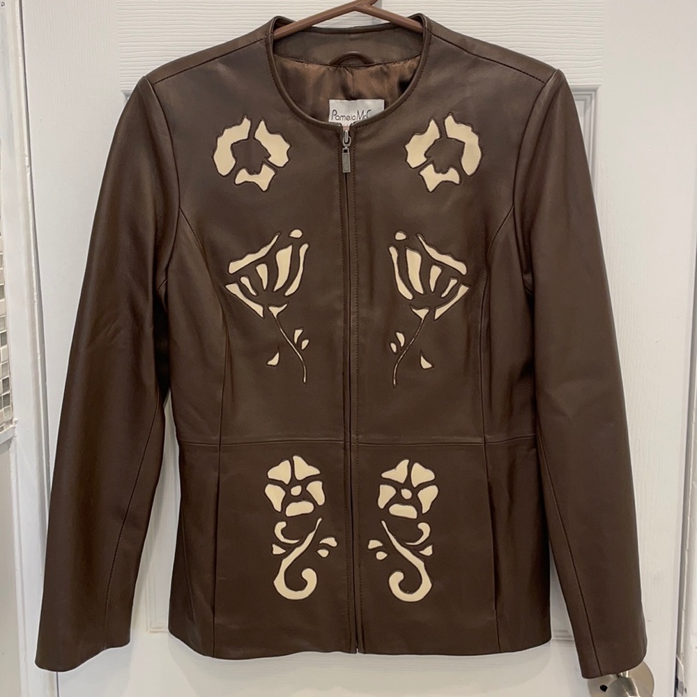 Pamela McCoy leather jacket with floral cutouts